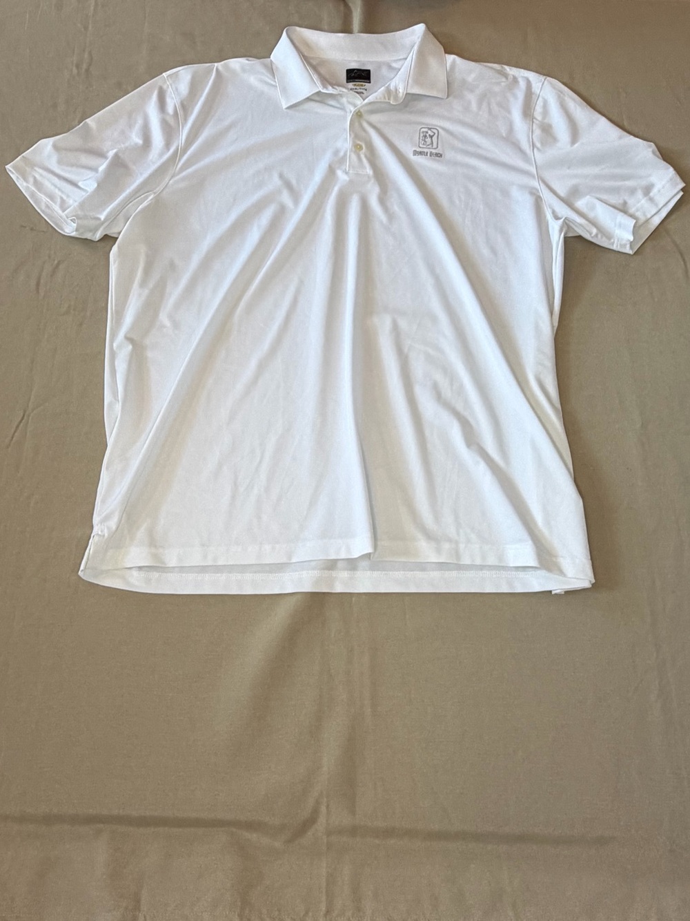 Greg Norman Collection Men's White Polo with Subtle Chest Logo